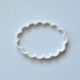 Scalloped oval cookie cutter