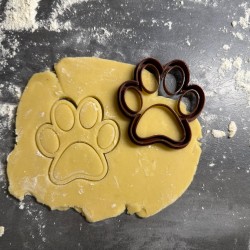 Emporte-pièce en forme de patte de chien